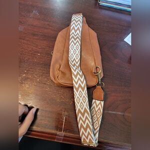 Tan sling bag